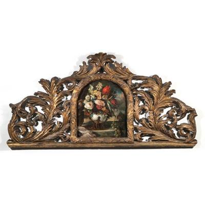 "ITALIANATE CARVED FRAME & OIL PAINTING | Having a central table-top foral still life with flowers and grapes (lined) within a...