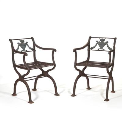 "(2pc) PAIR REGENCY CAST IRON GARDEN ARMCHAIRS | Having wreath & urn back
h. 28.5 x w. 20 x d. 20 in."