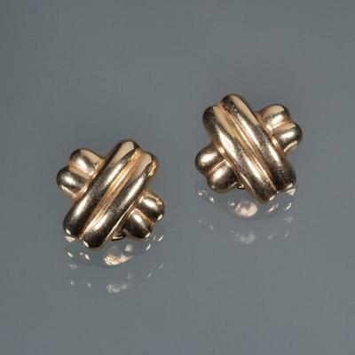 14K GOLD X FORM EARRINGS | Designed as a pair of 14K yellow gold clip-on earrings in x-shape, marked "14K"; 5.3g - w. 0.75 x l....