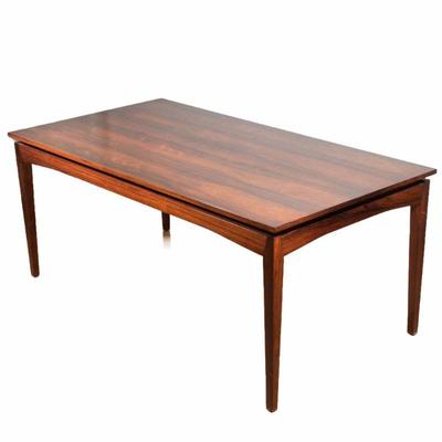 "DANISH MID-CENTURY ROSEWOOD DINING TABLE: BLOOMINGDALE'S C.1960/70'S | with hidden end-attached leaves,
h. 28.5 x w. 35.5...