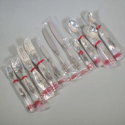 (252pc) REED & BARTON STERLING FLATWARE SERVICE | Sterling silver flatware service for 18 in the "Vienna" pattern, new in...