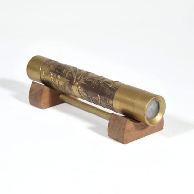 "STEPHEN AUGER KALEIDOSCOPE | Textured brass cylinder kaleidoscope, signed with artist's initials and dated 1987 at the...