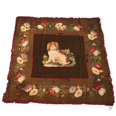 ANTIQUE NEEDLEPOINT / HOOKED RUG | with an applied needlepoint panel depicting a King Charles spaniel - w. 64 x l. 64 in.