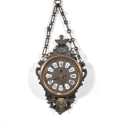 "FRENCH CHATELAINE WALL CLOCK | With enameled porcelain Roman numeral markers, with sun king pendulum and crested by a bird and...