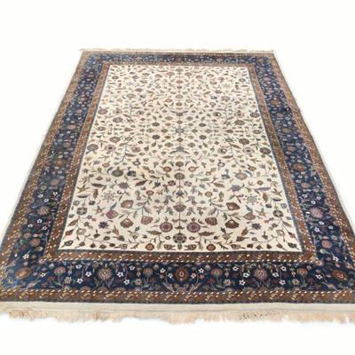 CREAM & BLUE SCULPTED CARPET | having a cream field with overall pattern, blue border - w. 116 x l. 169 in.