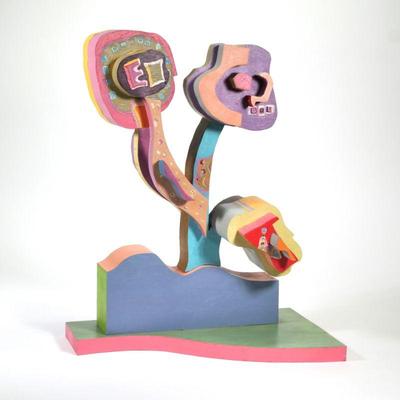 "V. BROWN ABSTRACT PAINTED WOOD SCULPTURE | Cut wooden forms painted in various bright colors in the shape of blooming flowers
h. 22...
