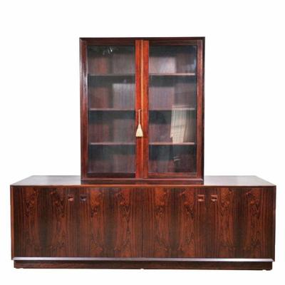 "DANISH MID CENTURY ROSEWOOD CREDENZA: BLOOMINGDALE'S C. 1960/70'S | Or sideboard cabinet, having two glazed doors over a...