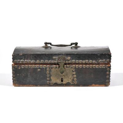 "ANTIQUE LEATHER TACKED DOCUMENT BOX, ONGONQUIT ME | An early 19th C leather covered pine, domed form Document box.Box has a brass...