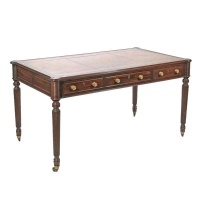 A VERY FINE REGENCY MAHOGANY DESK WITH LEATHER TOP | Having a stitched and gilt decorated inset leather top, "partner's...