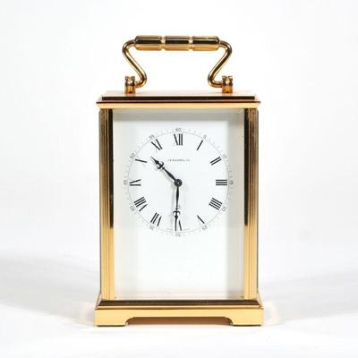 "J. E. CALDWELL CARRIAGE CLOCK | J. E. Caldwell Co., with Concord Clock Co. Swiss movement, the face with Roman numeral hour markers...