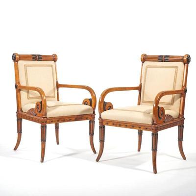 PAIR LATE 19TH CENTURY EBONIZED CARVED ARMCHAIRS | A pair of carved oak and ebonized wood armchairs, 19th century. Cylindrical turned and...