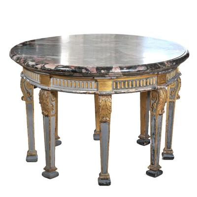 IMPORTANT 18TH CENTURY FRENCH NEOCLASSICAL CENTRE TABLE | Having an impressive round three-inch thick variegated marble top with an ogee...