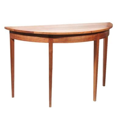 "THOMAS MOSER DEMILUNE TABLE | Signed by Thomas Moser Cabinet Makers, Auburn ME. 2004 and signed by the maker
h. 30 x w. 48 x d....