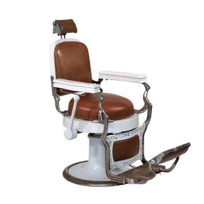 "KOKEN ROUND SEAT ANTIQUE BARBERS CHAIR (1 OF 2) | c. 1910, one of a matched pair
h. 47.75 x w. 28 x l. 44 in."