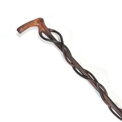 CONTINUOUS CARVED WOOD WALKING STICK | h. 37 x w. 3.75 in.
