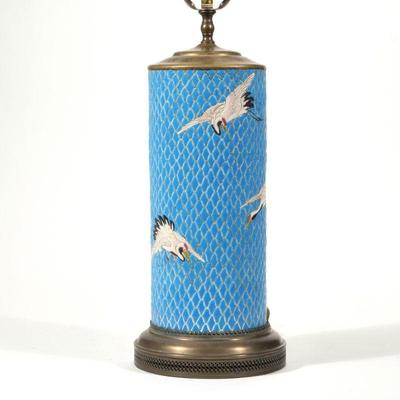 "JAPANESE PORCELAIN TABLE LAMP | Cylindrical vase or brush pot of large size, sculpted porcelain decorated with cranes in flight on...