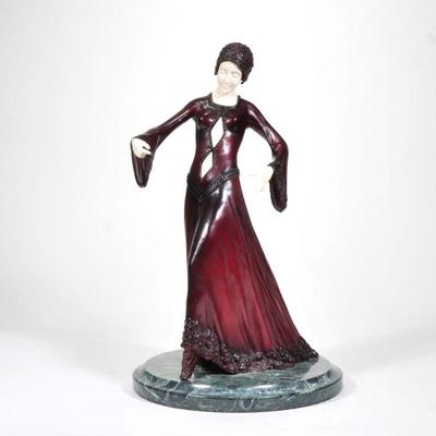 "AFTER CHIPARUS PAINTED BRONZE | Woman in red dress
h. 18.5 x dia. 11 in."