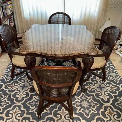 Granite Table And Cane Chairs