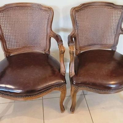 Two French Louis XV Style Matching Leather Armchairs