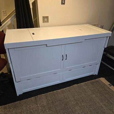 This is a hidden bed!  Love this piece.