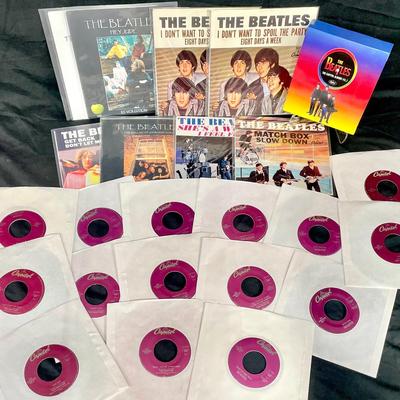 The Beatles 7” Vinyls And Memorabilia 