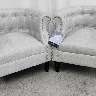 Two SIGNATURE DESIGN BY ASHLEY Mid-Size Lounge Chairs.