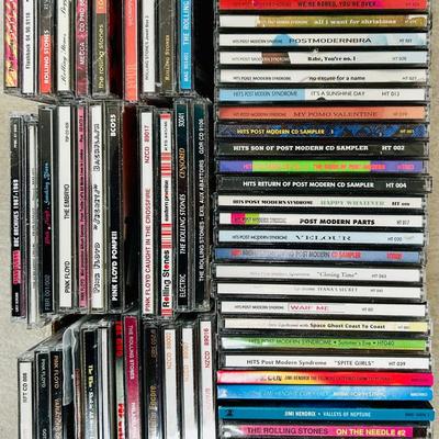 Box of CDs:  Post Modern Syndrome, Pink Floyd, Stones & More