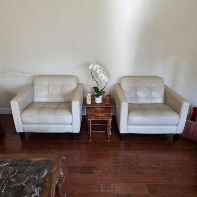 Mid century modern style Italian leather chairs