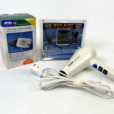 Hair dryer (turns on) Blood Pressure Monitor (not tested), Personal Alarm (New in package not tested)