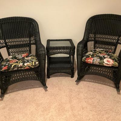 Pair Black Resin Wicker Rockers And Glass Top Side Table