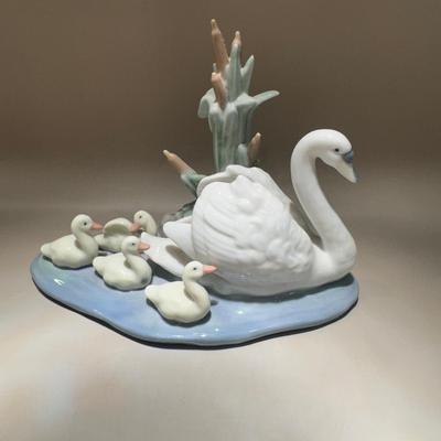 Lladro porcelain figurine titled “Family Gathering”