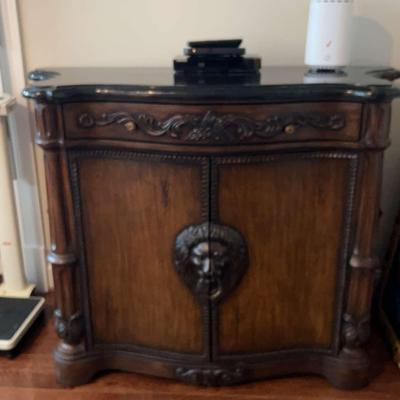 Dark Wood Decorative Buffet With Lion Detailing