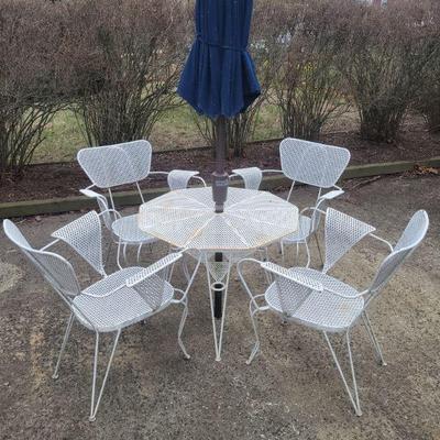 All metal patio set / Umbrella.  $92