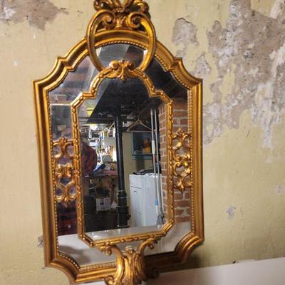  A gilded mirror..
$17