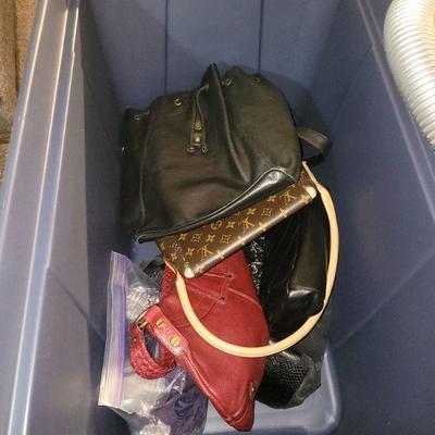 Various bins of purses