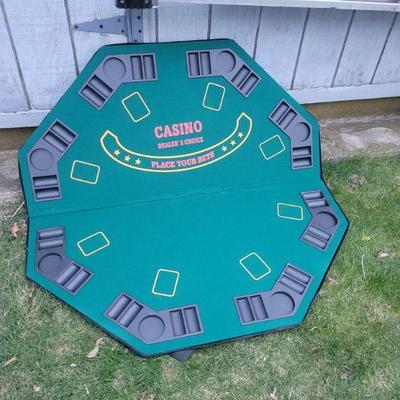 Foldable poker table in carrying case.  $14