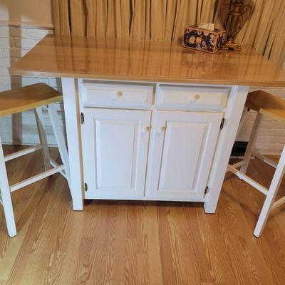 Awesome Kitchen island with stools. 54" W ' 29" D x 47" High. Plexi top includedTop. $135 Woth Stools!