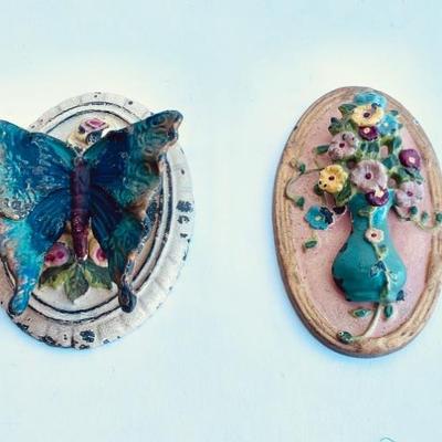 Left - rare Rosa May Pickard  butterfly door knocker
right - Hubley vase and flower knocker 