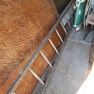 Long wooden ladder great for a booth