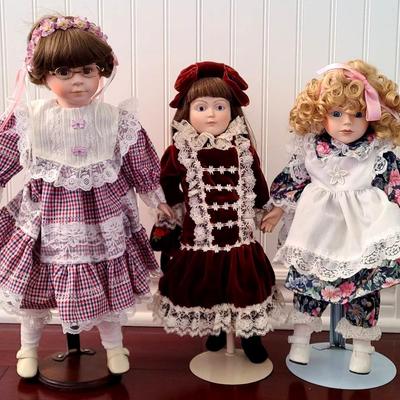 Storybook Sweethearts with Glasses, Velvet, and Floral Dreams - Porcelain Doll Trio