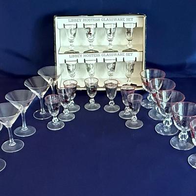 Lot 414: The Libbey Hostess Glassware Sets And Beefeater London Gin Glasses