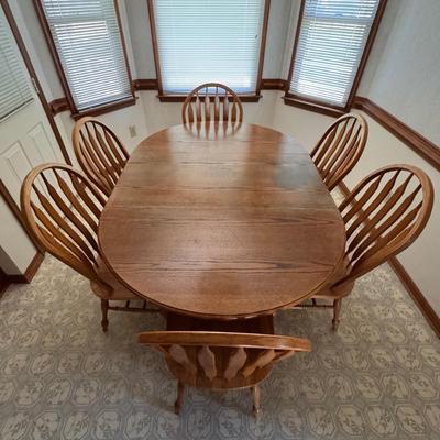 Lot 224: Oak 9 Piece Dining Set 