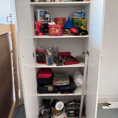 White Tool Storage Cabinet with Home Maintenance Items 