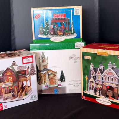 Four Christmas Villages  From Different Makers 