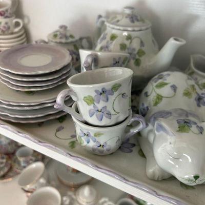 So many tiny tea sets for dolls. 