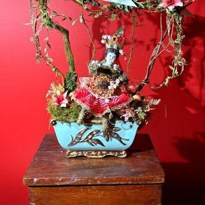 Garden floral diorama sitting on old shoe shinola box