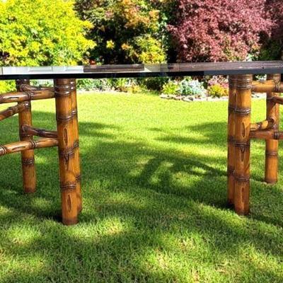 Glass topped table with bamboo base