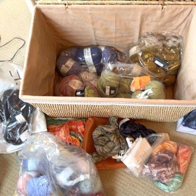 Large wicker trunk full of knitting yarn