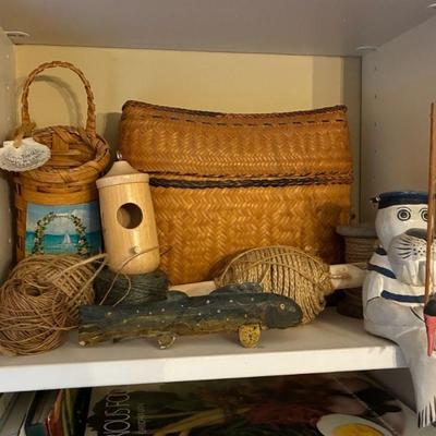Handwoven basket with lid and carved fish