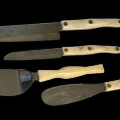 White cutco knives and serving utensils